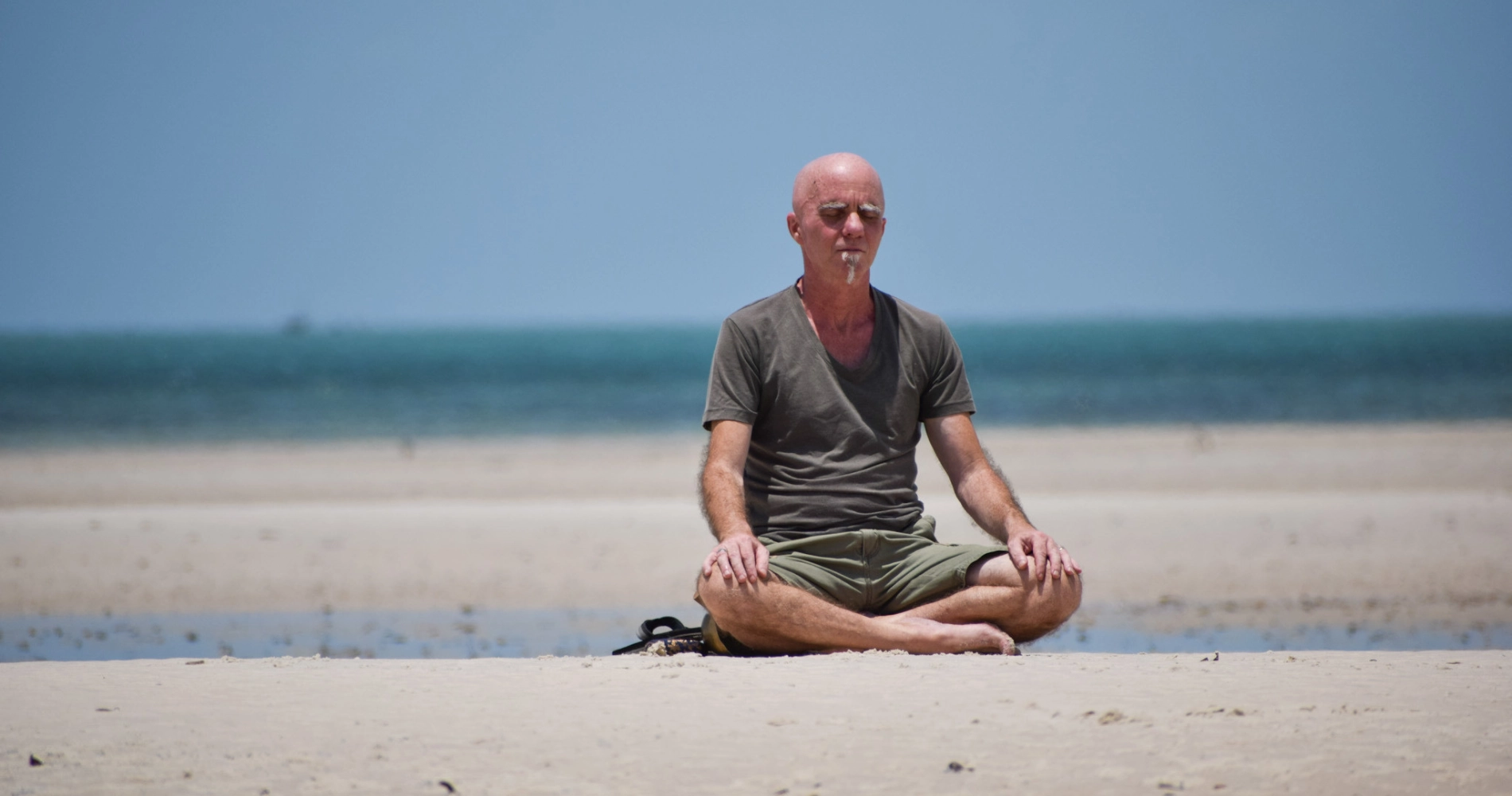 Gerry meditation on beach Vilanculos Solo or duo wellbeing meditation retreat Africa Mozambique
