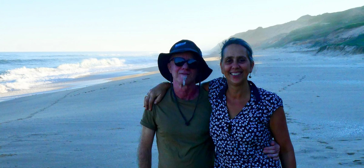 Couple standing together on the Wild Coast of Mozambique.